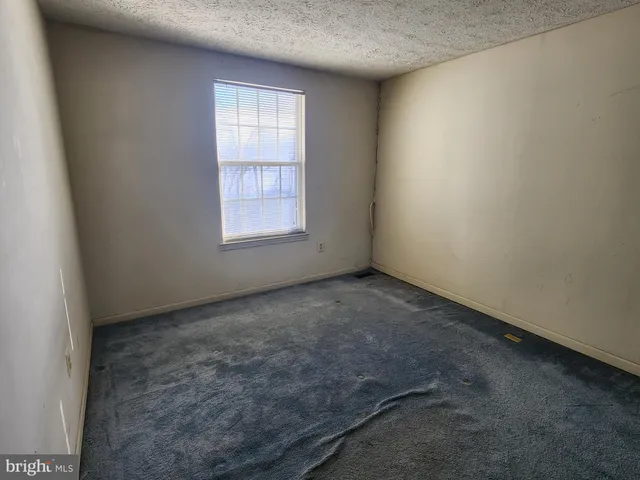 a view of stairs and a yard