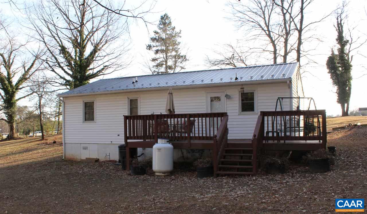 4143 Orange Road Aroda, VA 22709 - Photo 13 of 16 a view of a house with backyard and sitting area