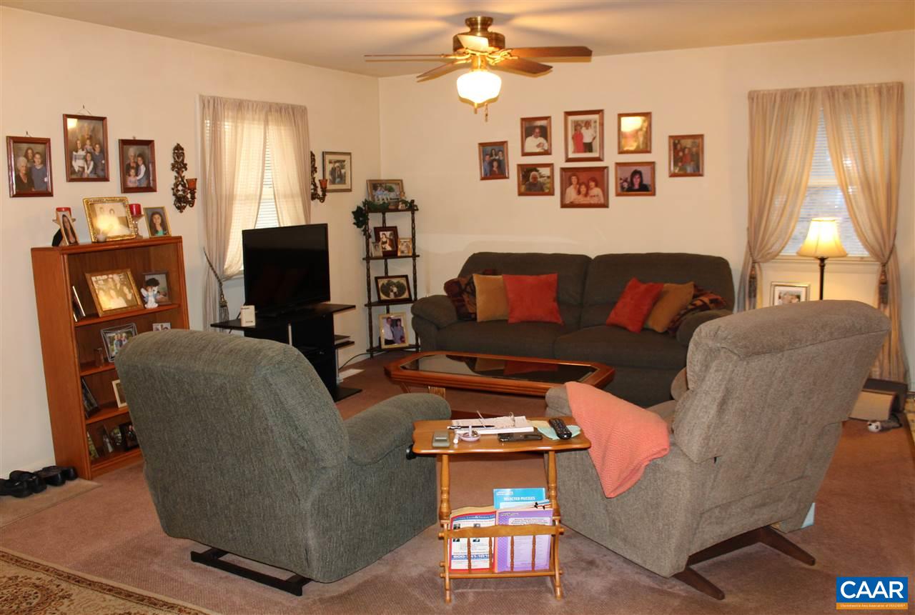 4143 Orange Road Aroda, VA 22709 - Photo 4 of 16 a living room with furniture and a flat screen tv