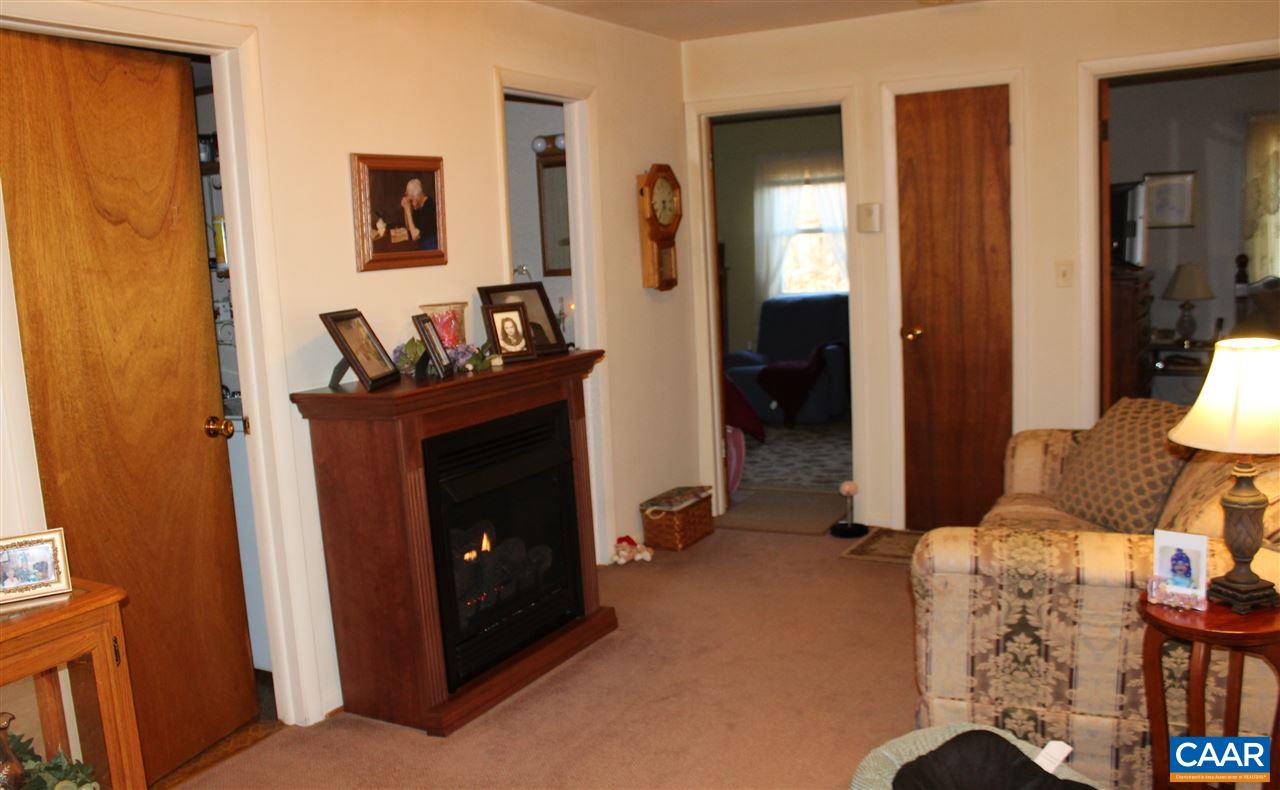 4143 Orange Road Aroda, VA 22709 - Photo 6 of 16 a living room with furniture and a fireplace