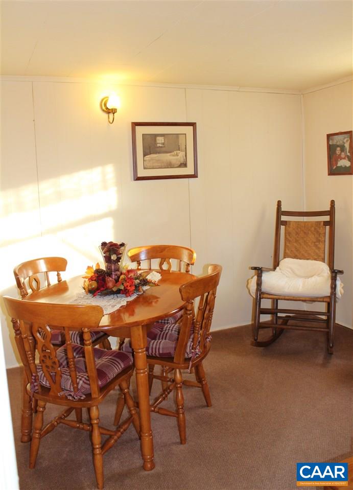 4143 Orange Road Aroda, VA 22709 - Photo 7 of 16 a dining room with furniture and wooden floor