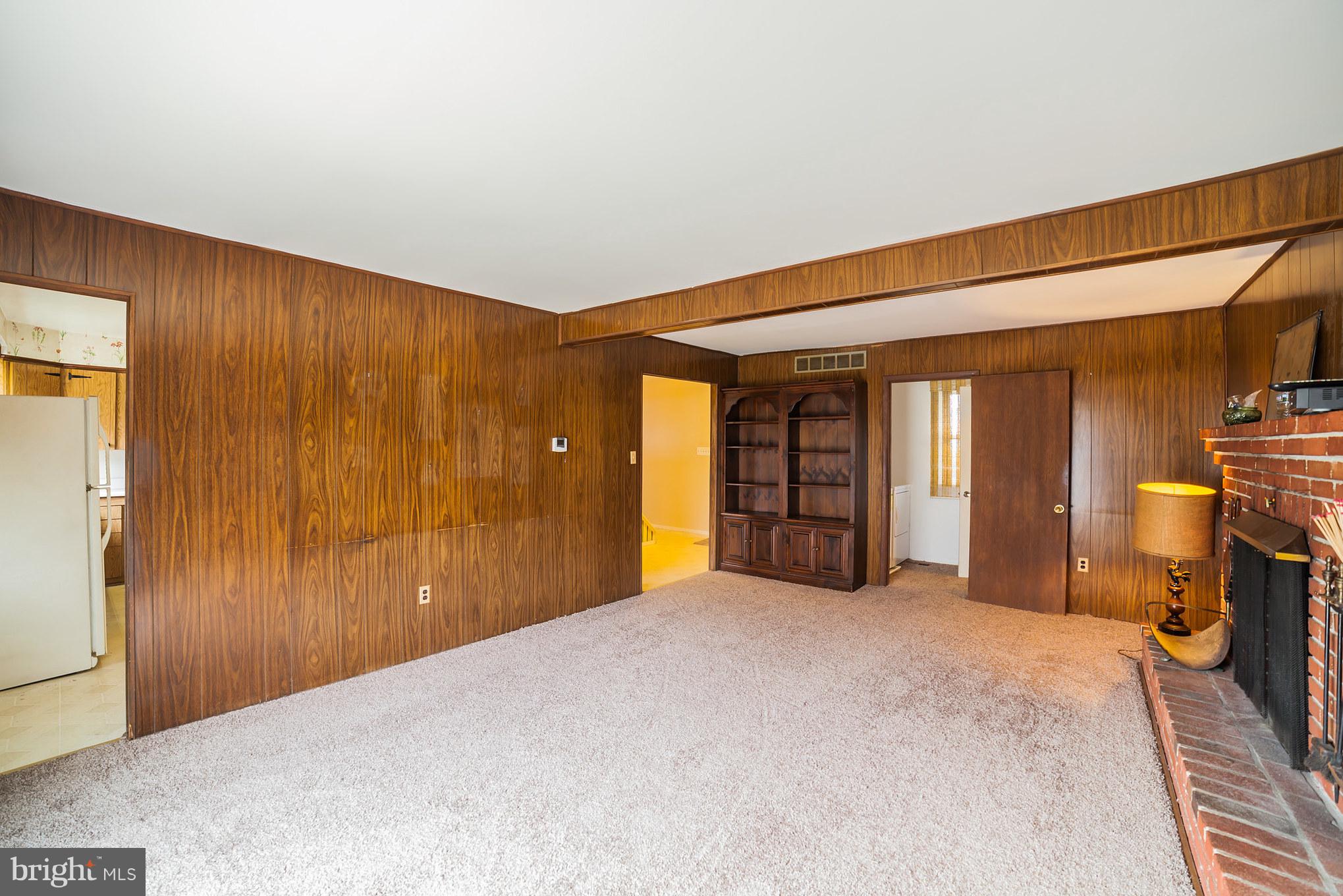 3903 Carthage Road Randallstown, MD 21133 - Photo 15 of 24 a view of a livingroom with a staircase