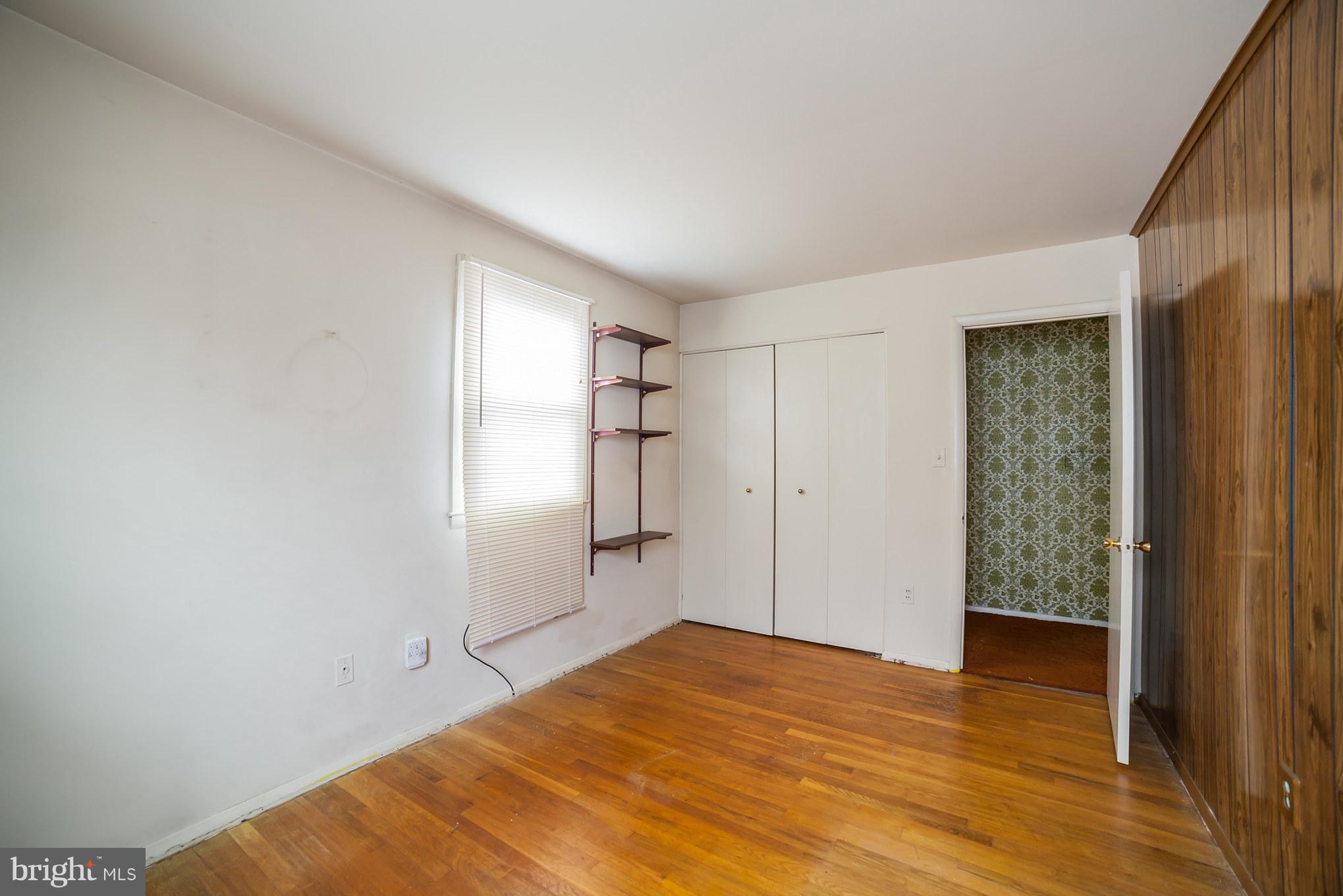 3903 Carthage Road Randallstown, MD 21133 - Photo 19 of 24 a view of empty room with wooden floor and fan