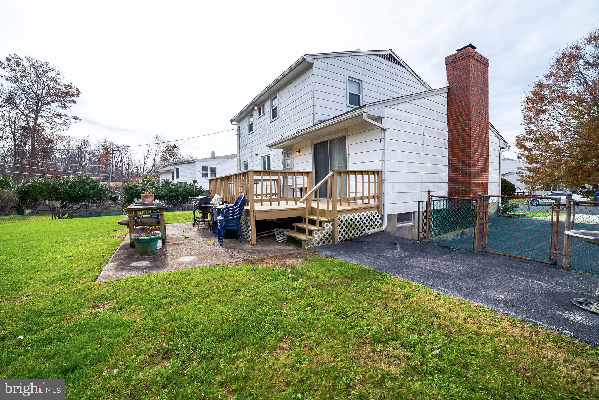 3903 Carthage Road Randallstown, MD 21133 - Photo 6 of 24 a view of a house with a back yard