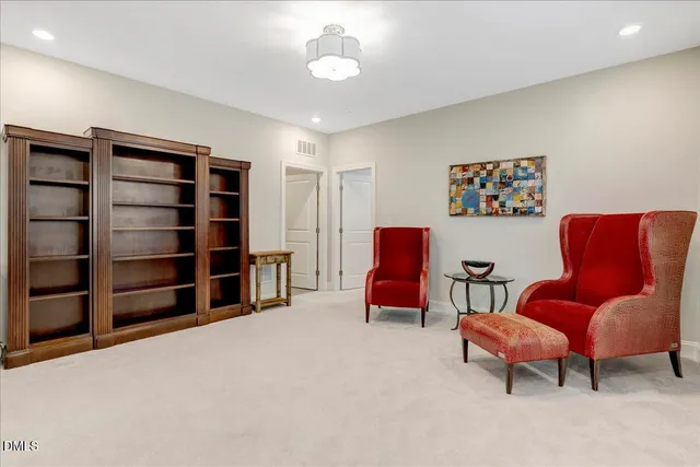 a view of a living room and balcony