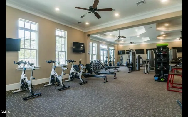 a view of a house with pool and chairs