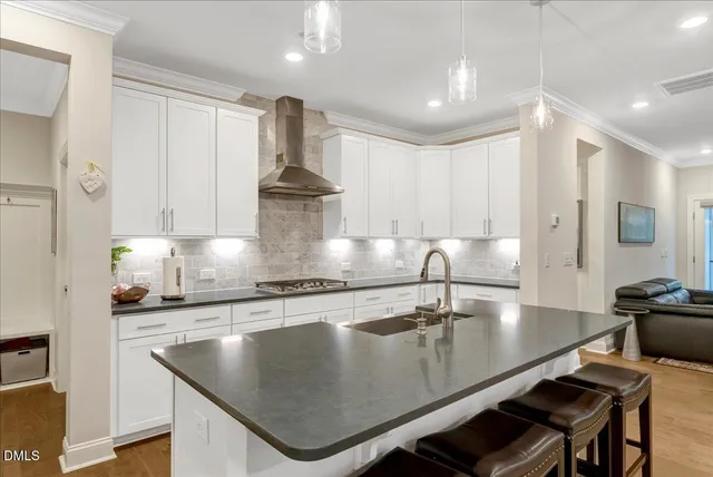 a view of entryway with wooden floor and stairs