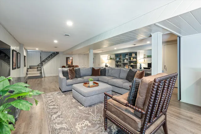 a living room with furniture and a table