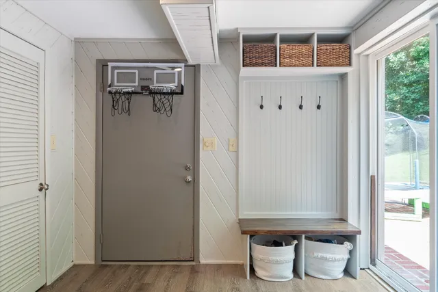 a large bathroom with a granite countertop sink a toilet and bathtub