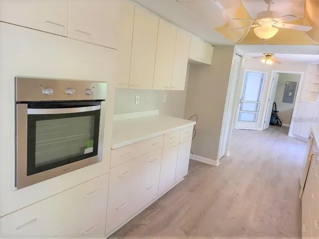 a utility room with a sink dryer and washer