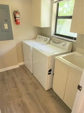 a utility room with dryer and washer