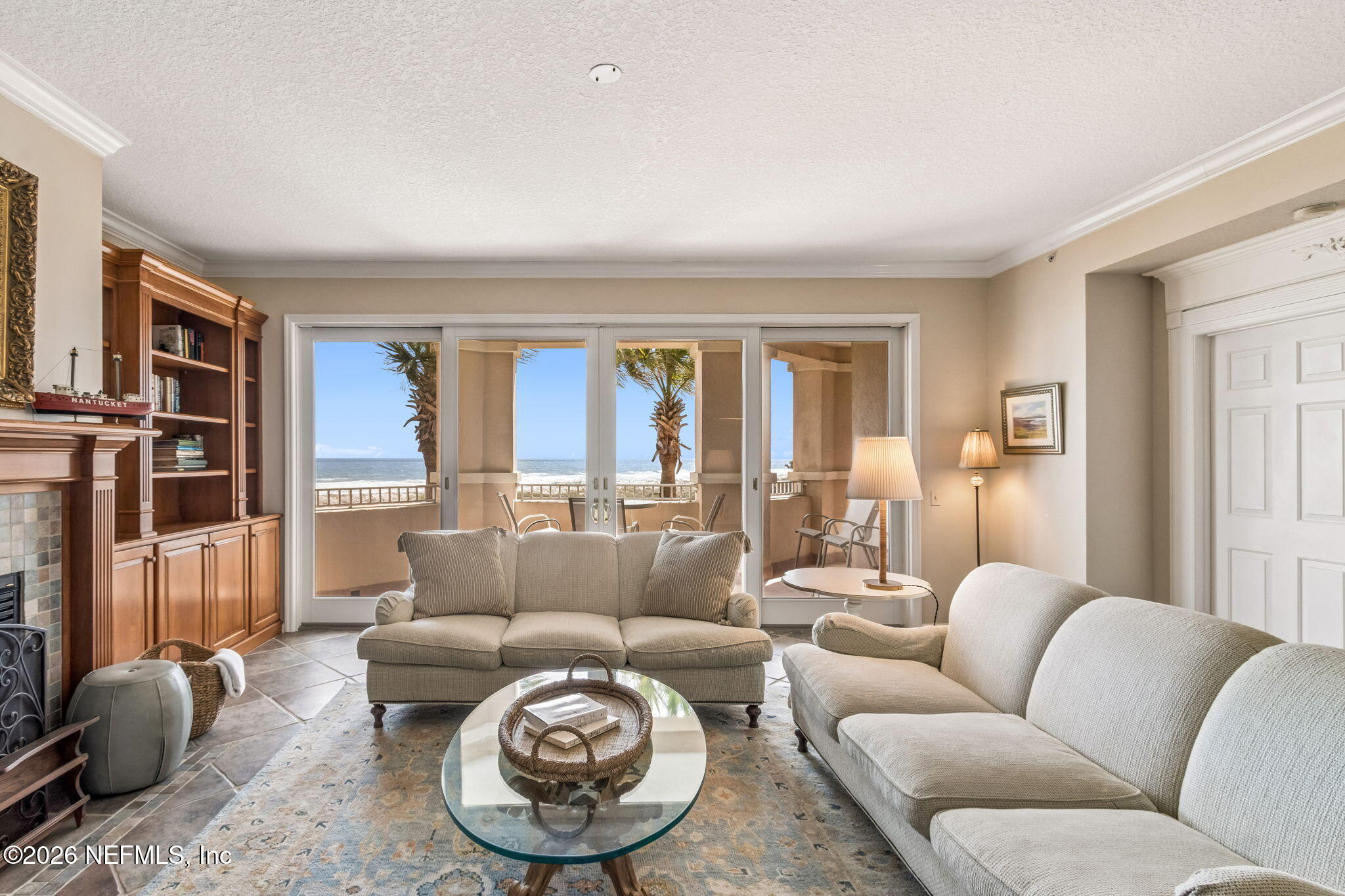404 Beachside Place Fernandina Beach, FL 32034 - Photo 13 of 96 a living room with furniture and a large window