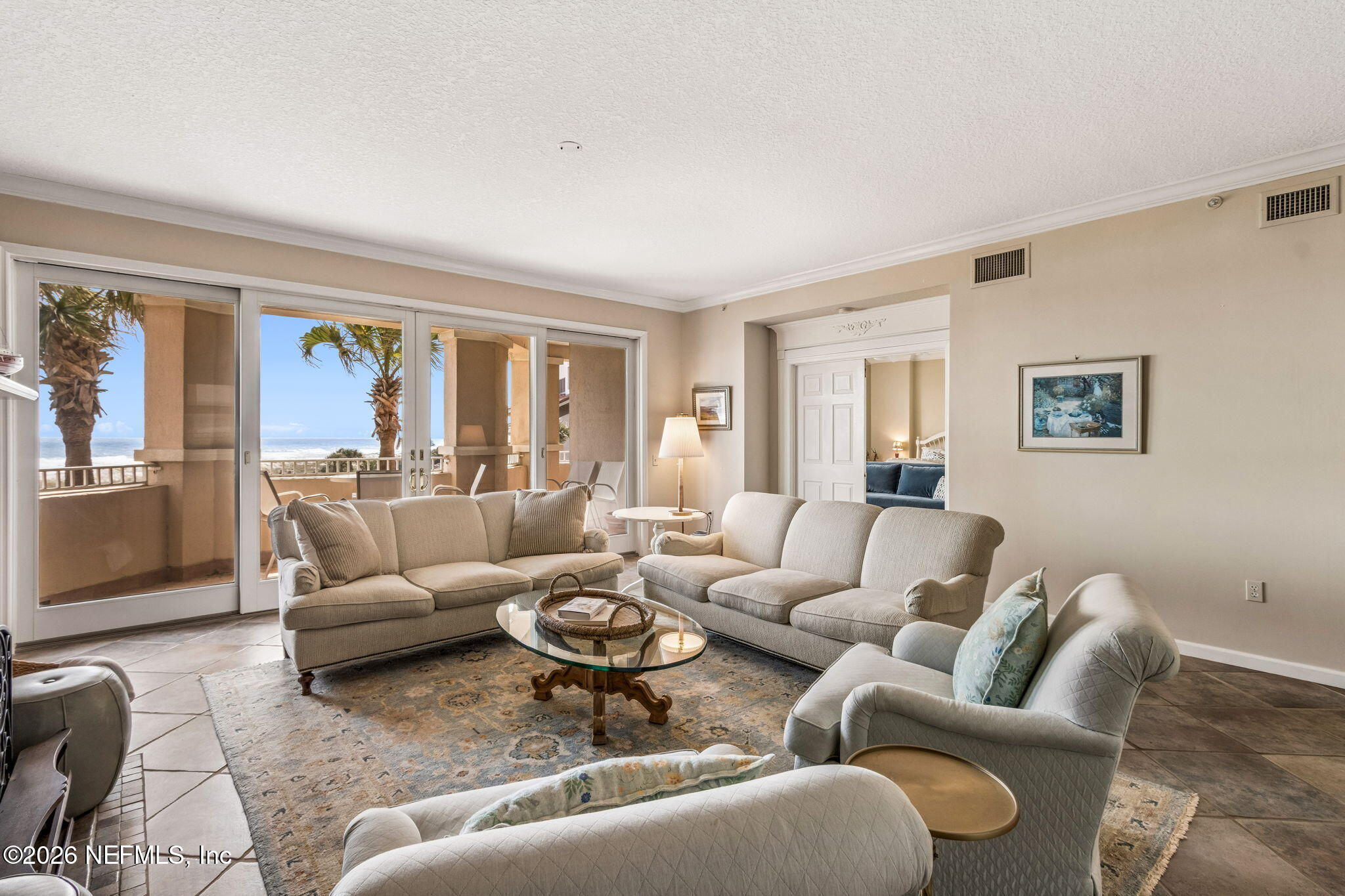 404 Beachside Place Fernandina Beach, FL 32034 - Photo 14 of 96 a living room with furniture and a large window