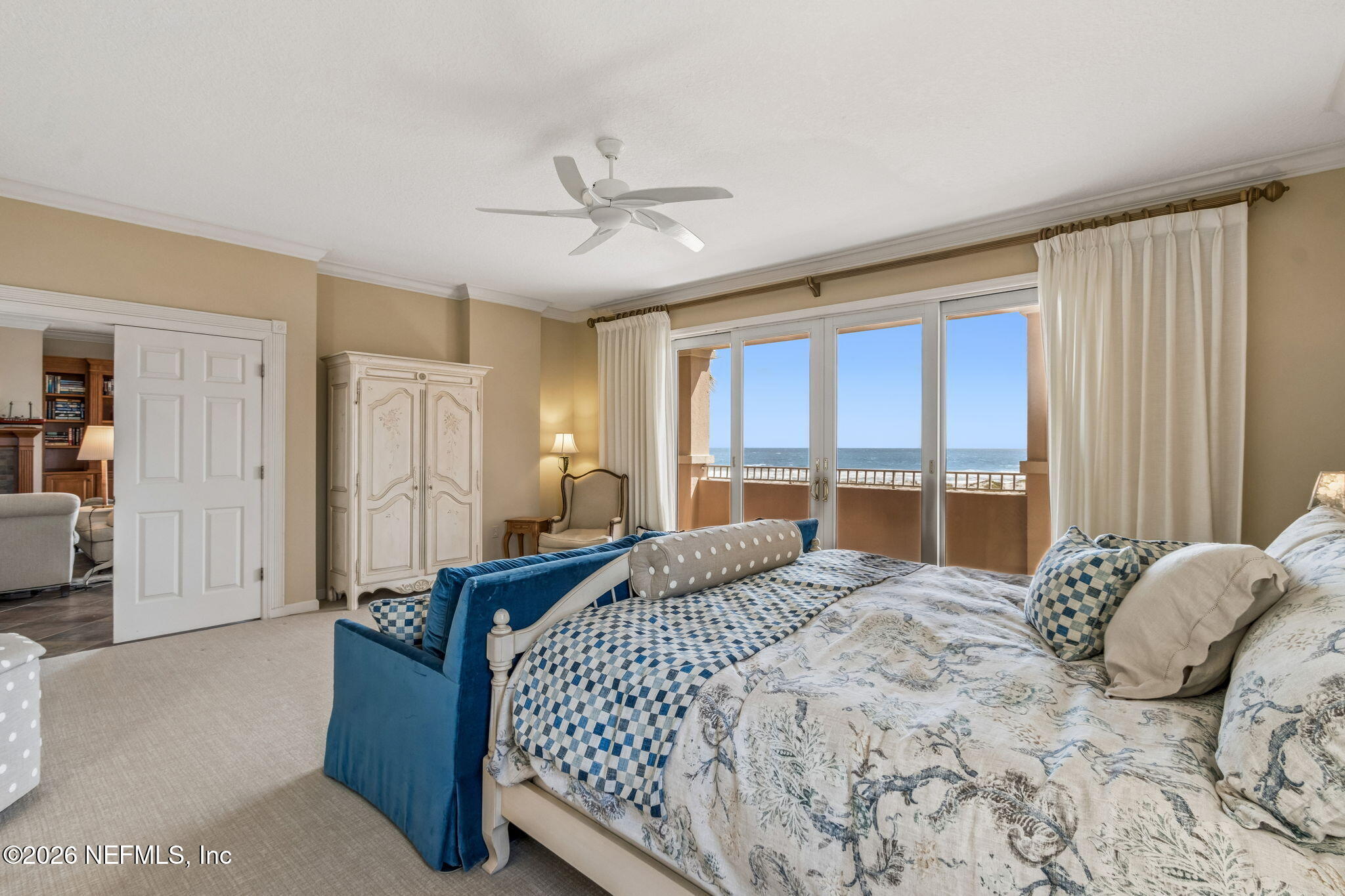 404 Beachside Place Fernandina Beach, FL 32034 - Photo 19 of 96 a bedroom with a large bed and a large window