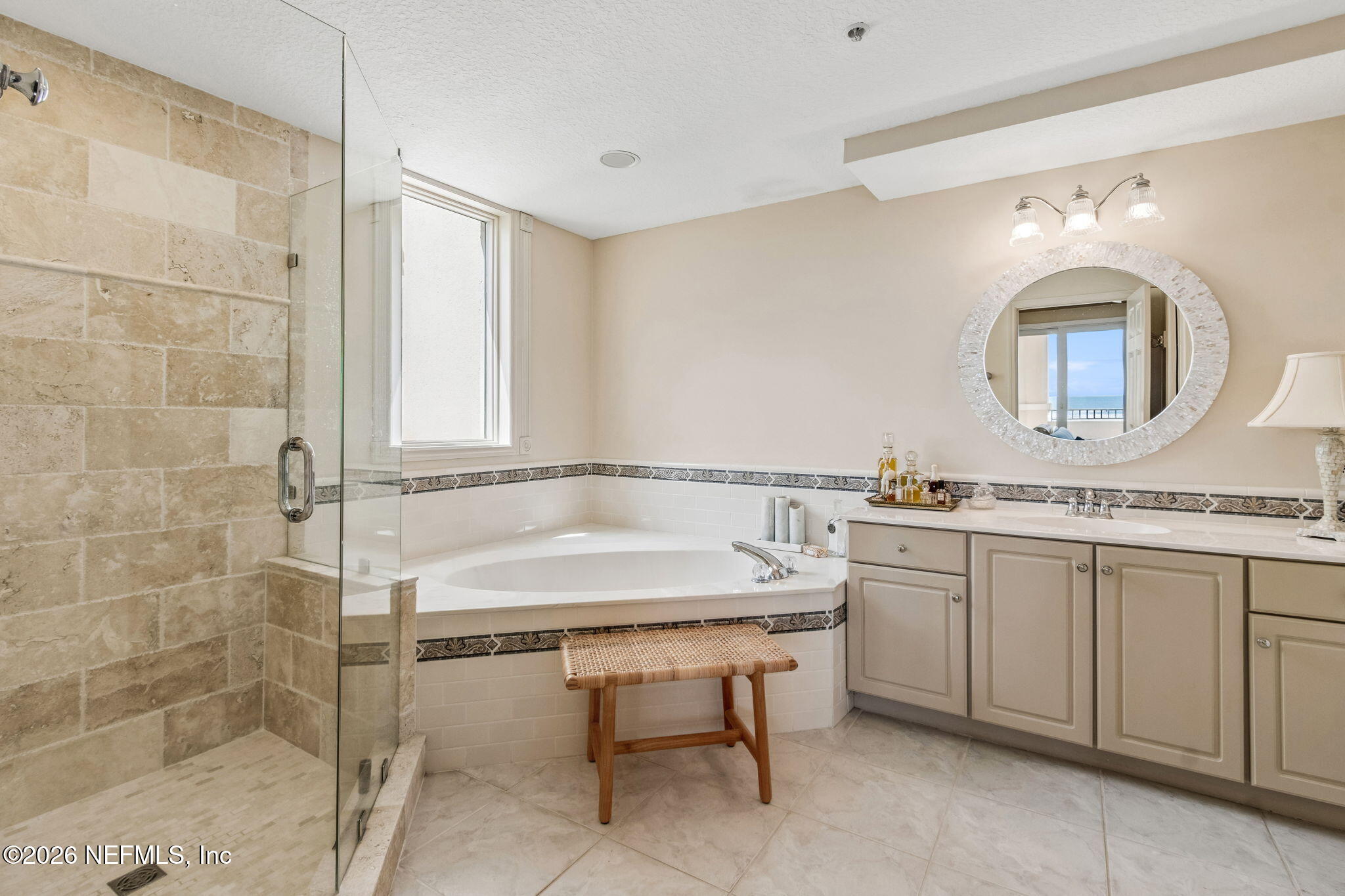 404 Beachside Place Fernandina Beach, FL 32034 - Photo 20 of 96 a bathroom with a sink and a mirror