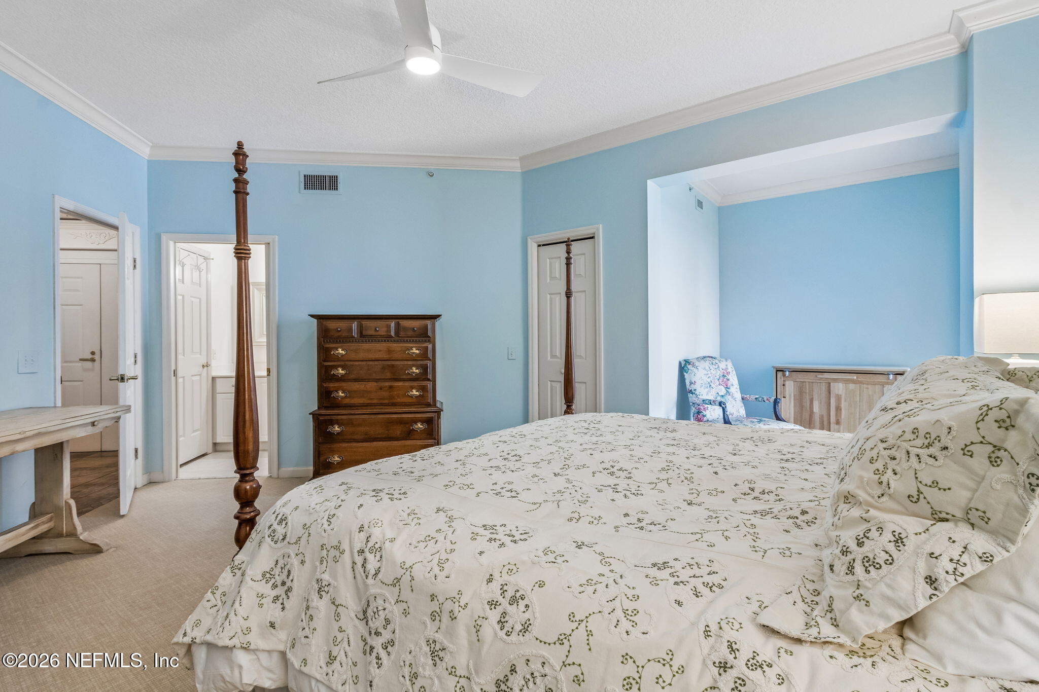 404 Beachside Place Fernandina Beach, FL 32034 - Photo 25 of 96 a bedroom with a bed and a dresser
