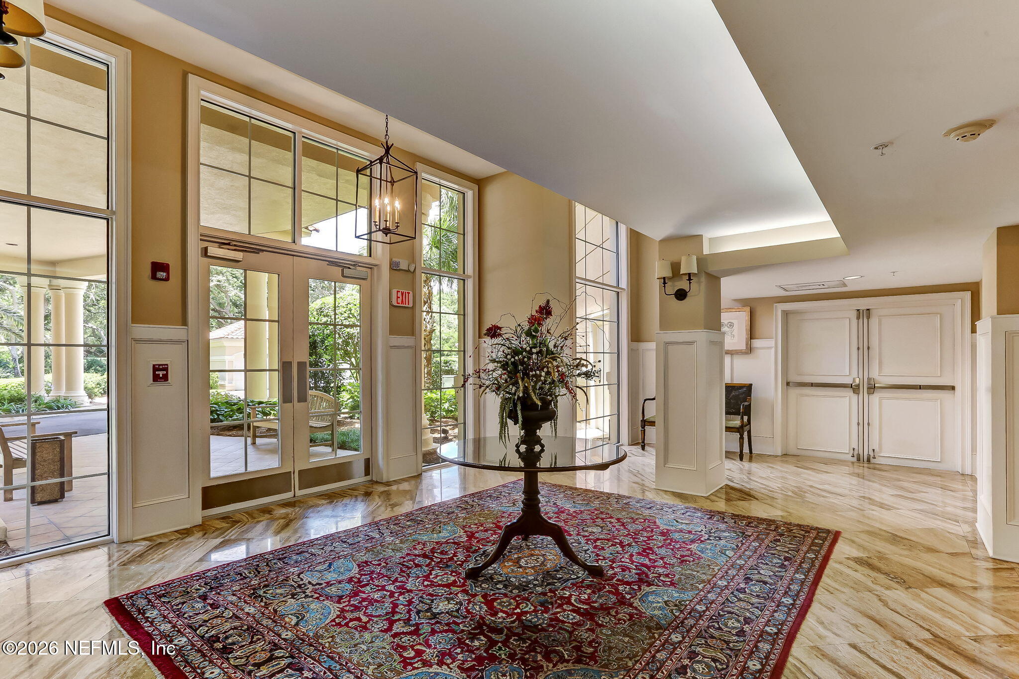 404 Beachside Place Fernandina Beach, FL 32034 - Photo 30 of 96 a very nice looking room with wooden floor and a rug