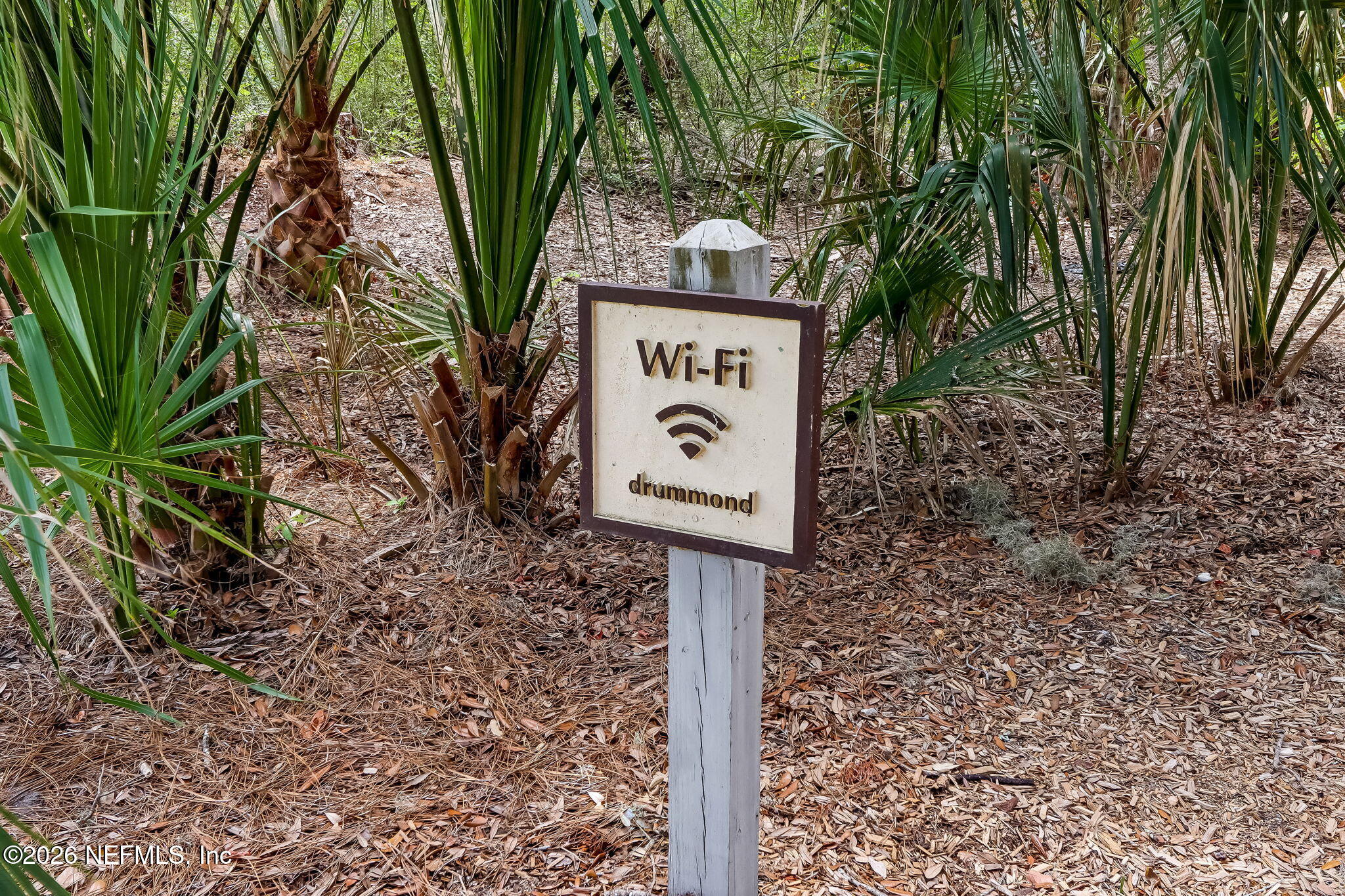 404 Beachside Place Fernandina Beach, FL 32034 - Photo 82 of 96 a sign on the side of a road