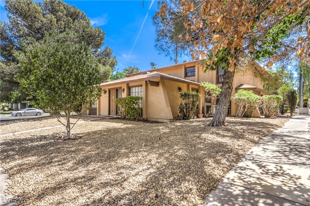 1553 Dorothy Avenue, Unit 4 Las Vegas, NV 89119 - Photo 3 of 36 View of front of home featuring stucco siding