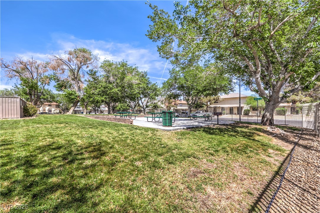 1553 Dorothy Avenue, Unit 4 Las Vegas, NV 89119 - Photo 32 of 36 View of yard with a patio