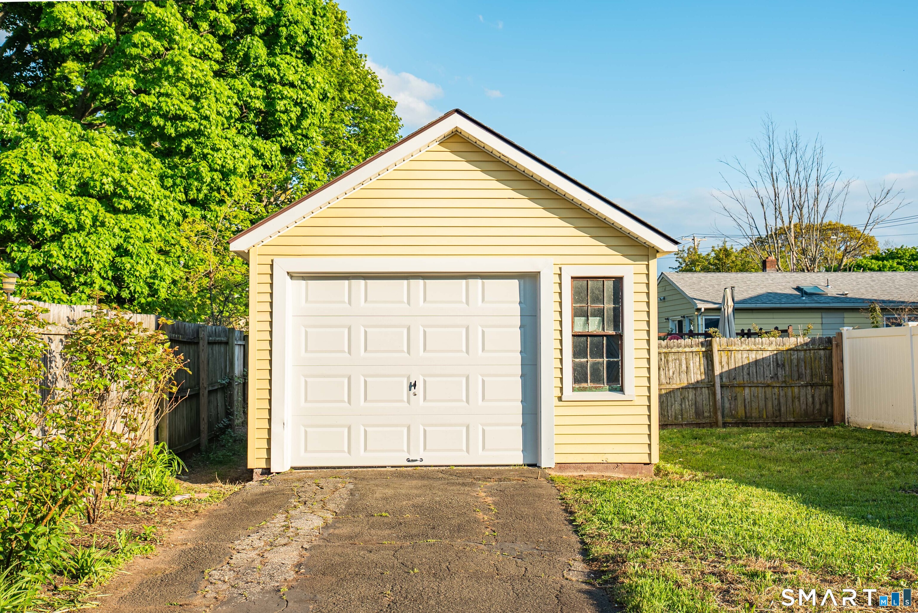 50 Jones Street West Haven, CT 06516 - Photo 17 of 21 a view of a house with a yard