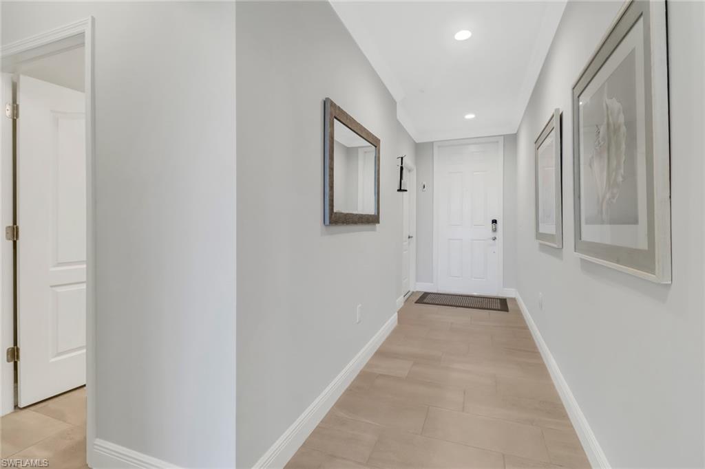 2295 Sawyers Hill Road, Unit 1002 Naples, FL 34120 - Photo 23 of 41 a view of hallway