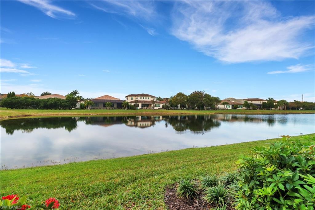 2295 Sawyers Hill Road, Unit 1002 Naples, FL 34120 - Photo 25 of 41 a view of a lake