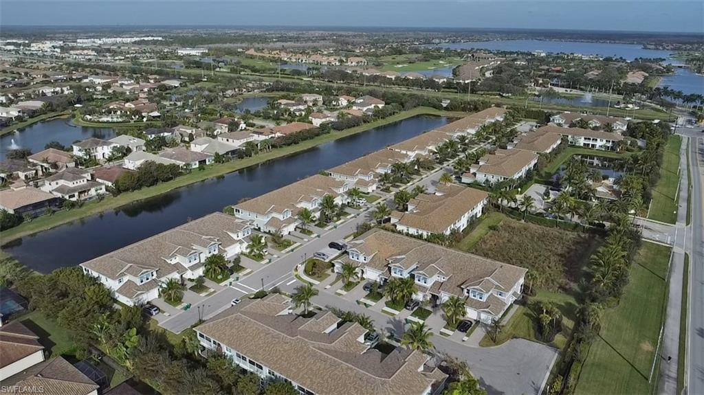 2295 Sawyers Hill Road, Unit 1002 Naples, FL 34120 - Photo 28 of 41 an aerial view of a city