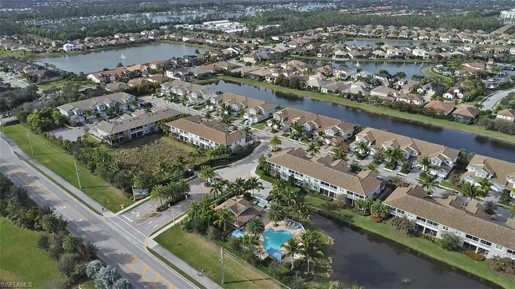 2295 Sawyers Hill Road, Unit 1002 Naples, FL 34120 - Photo 32 of 41 an aerial view of a city