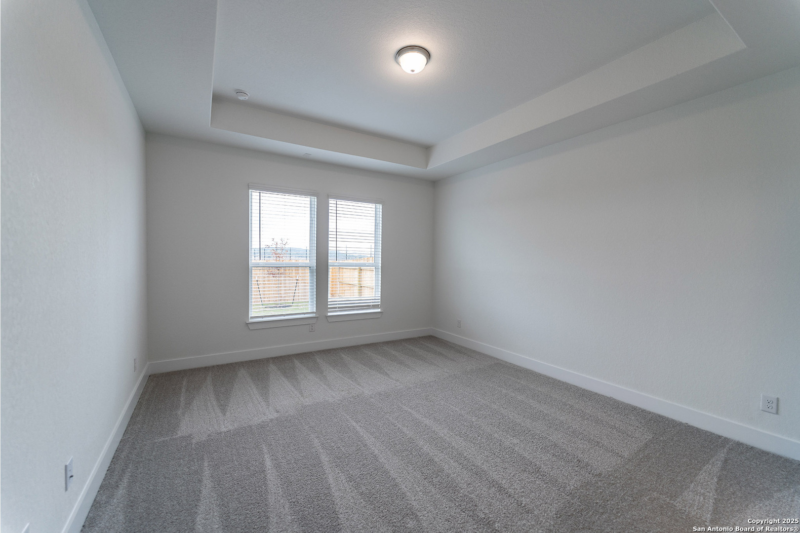 182 Ednie Lane Mico, TX 78056 - Photo 12 of 19 an empty room with a window