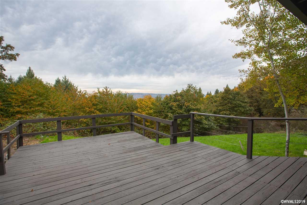 4158 Homestead Road South Salem, OR 97302 - Photo 35 of 39 a view of deck with mountain view and wooden floor