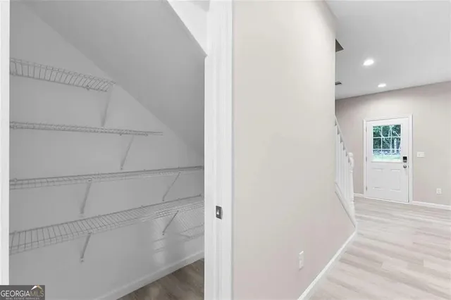 a view of an empty walk in closet