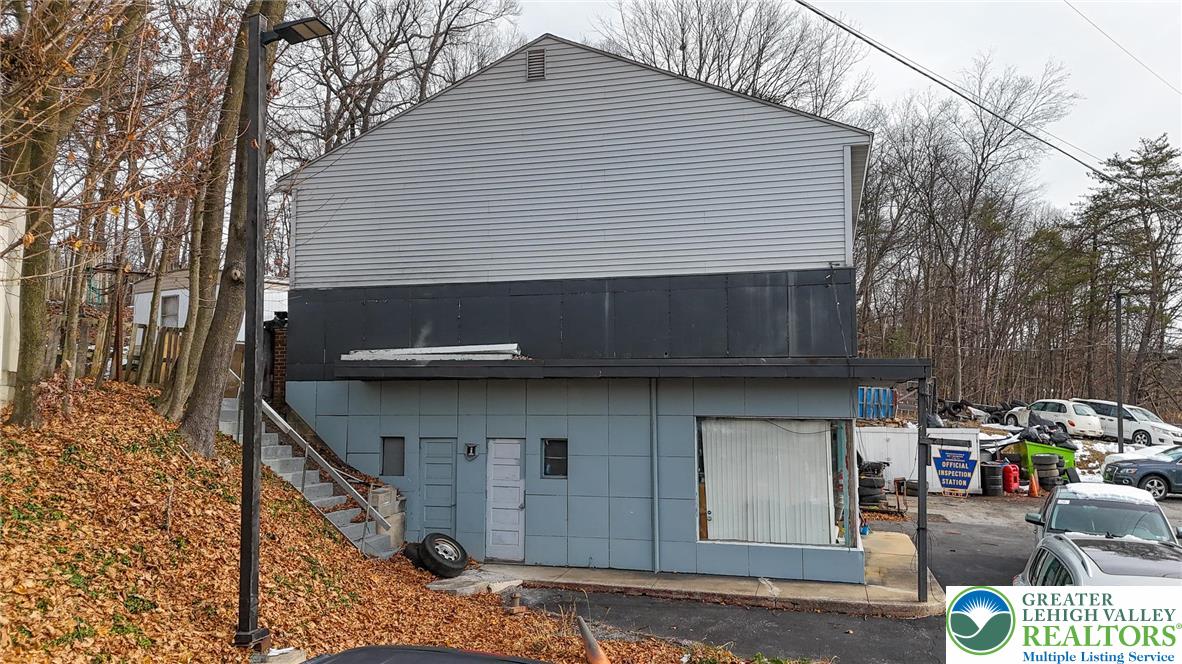 1791 Centre Turnpike Orwigsburg, PA 17961 - Photo 6 of 17 a front view of a house with a yard