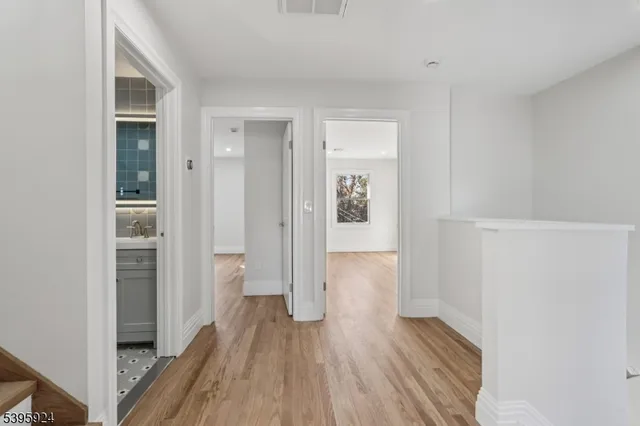 a view of wooden floor in an empty room
