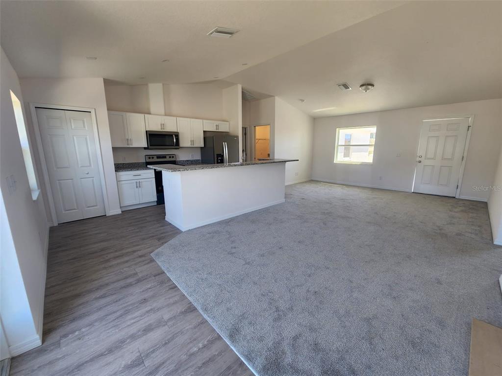 4381 East Ravenna Street Inverness, FL 34453 - Photo 14 of 44 a view of kitchen and microwave