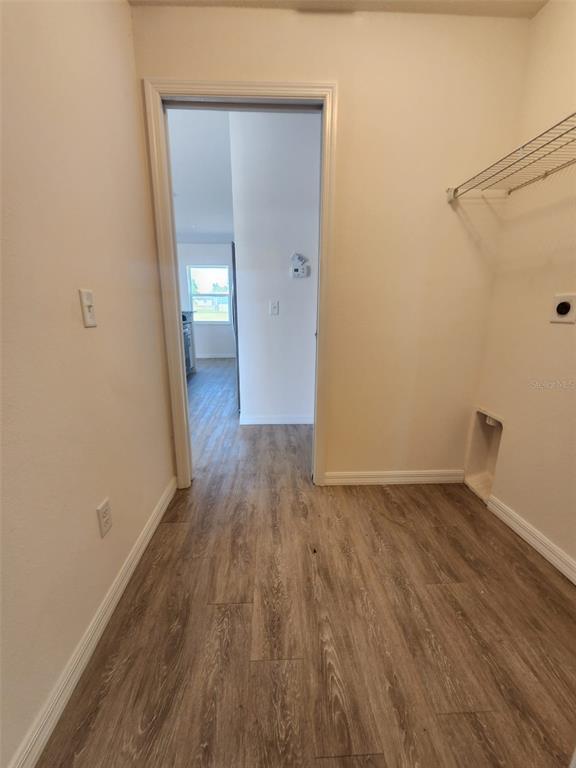 4381 East Ravenna Street Inverness, FL 34453 - Photo 36 of 44 a view of a room with wooden floor
