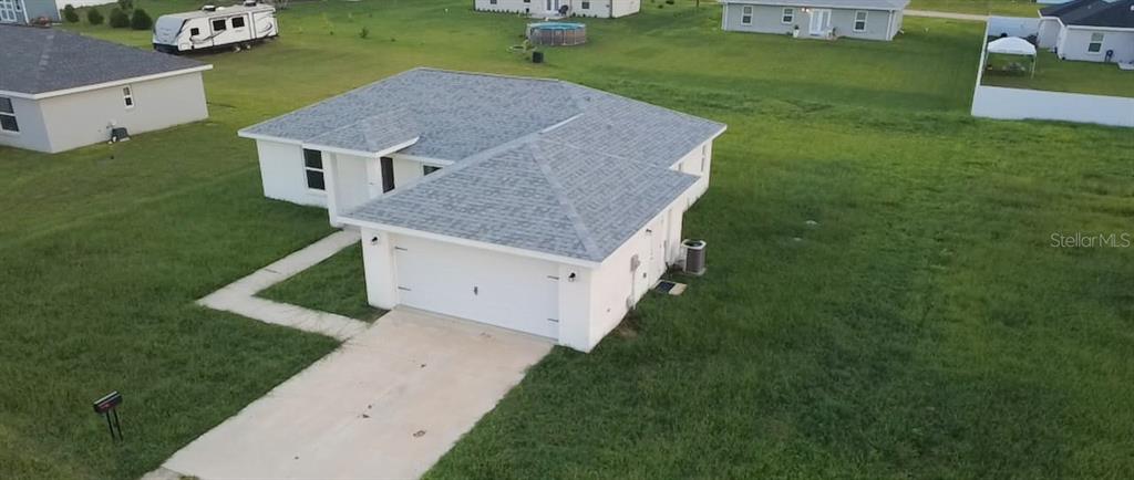 4381 East Ravenna Street Inverness, FL 34453 - Photo 39 of 44 an aerial view of a house