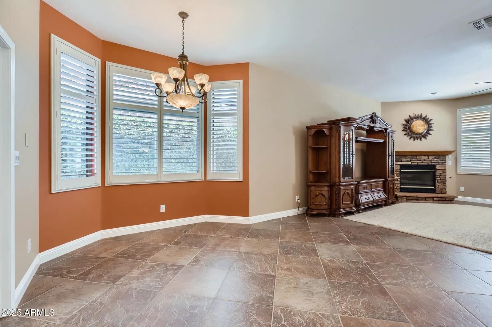 17951 West Sammy Way Surprise, AZ 85374 - Photo 12 of 24 a view of livingroom with furniture hardwood and windows