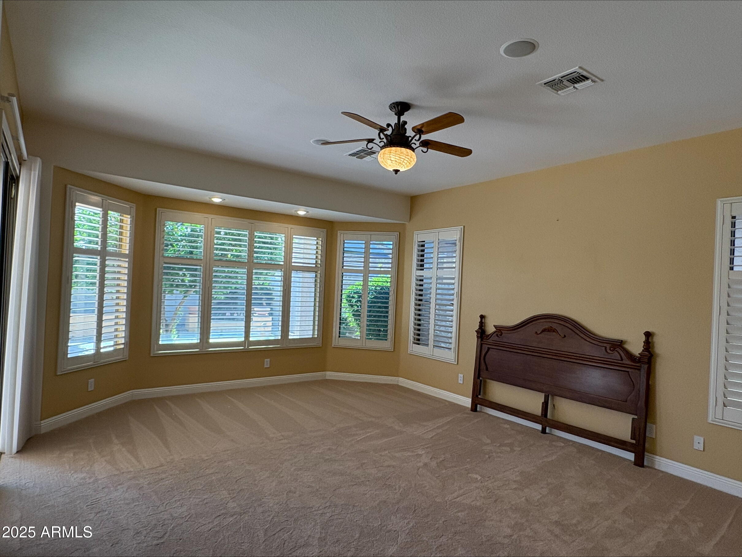 17951 West Sammy Way Surprise, AZ 85374 - Photo 14 of 24 a living room with furniture and a large window