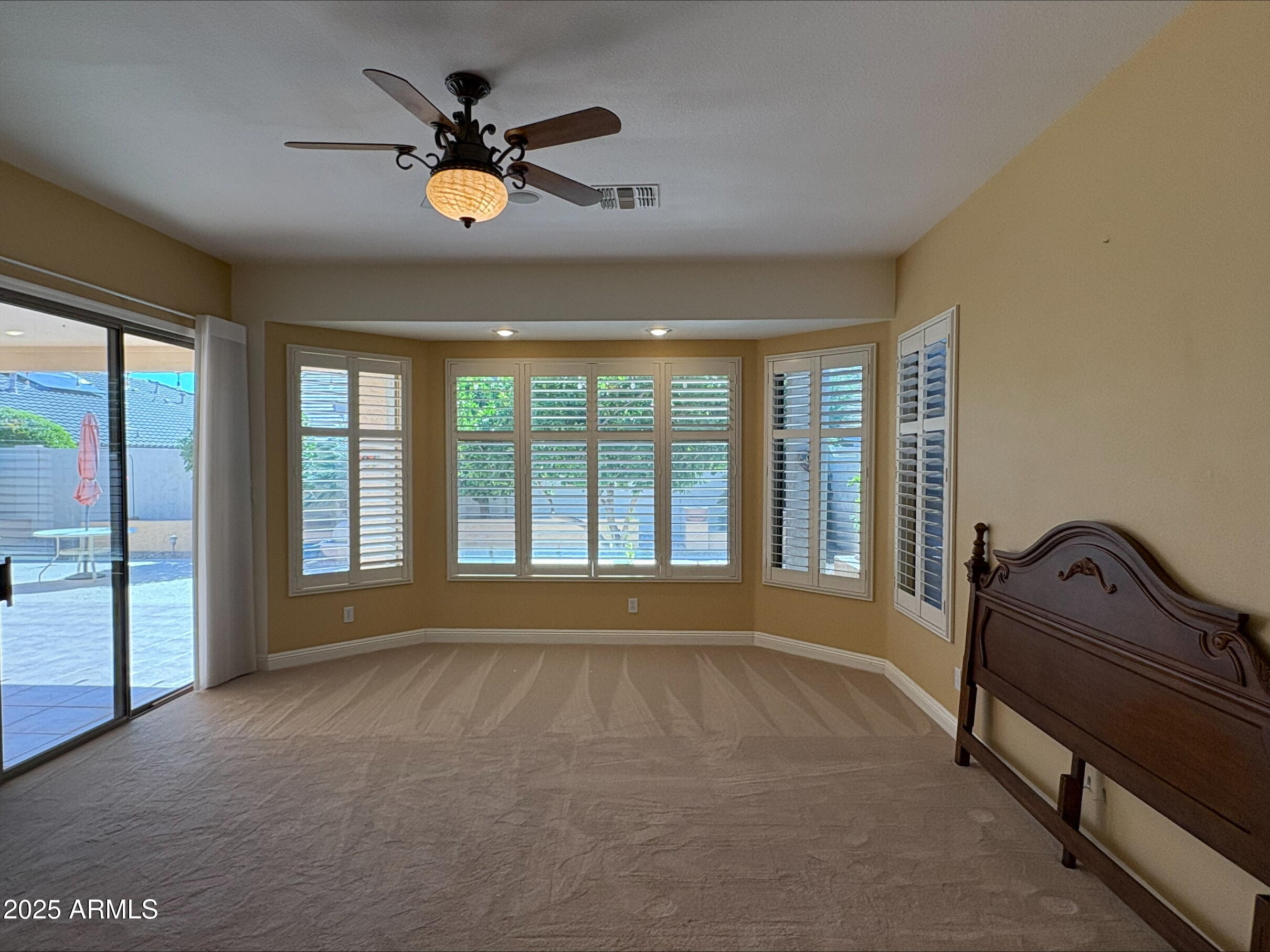 17951 West Sammy Way Surprise, AZ 85374 - Photo 15 of 24 a view of an empty room with a window