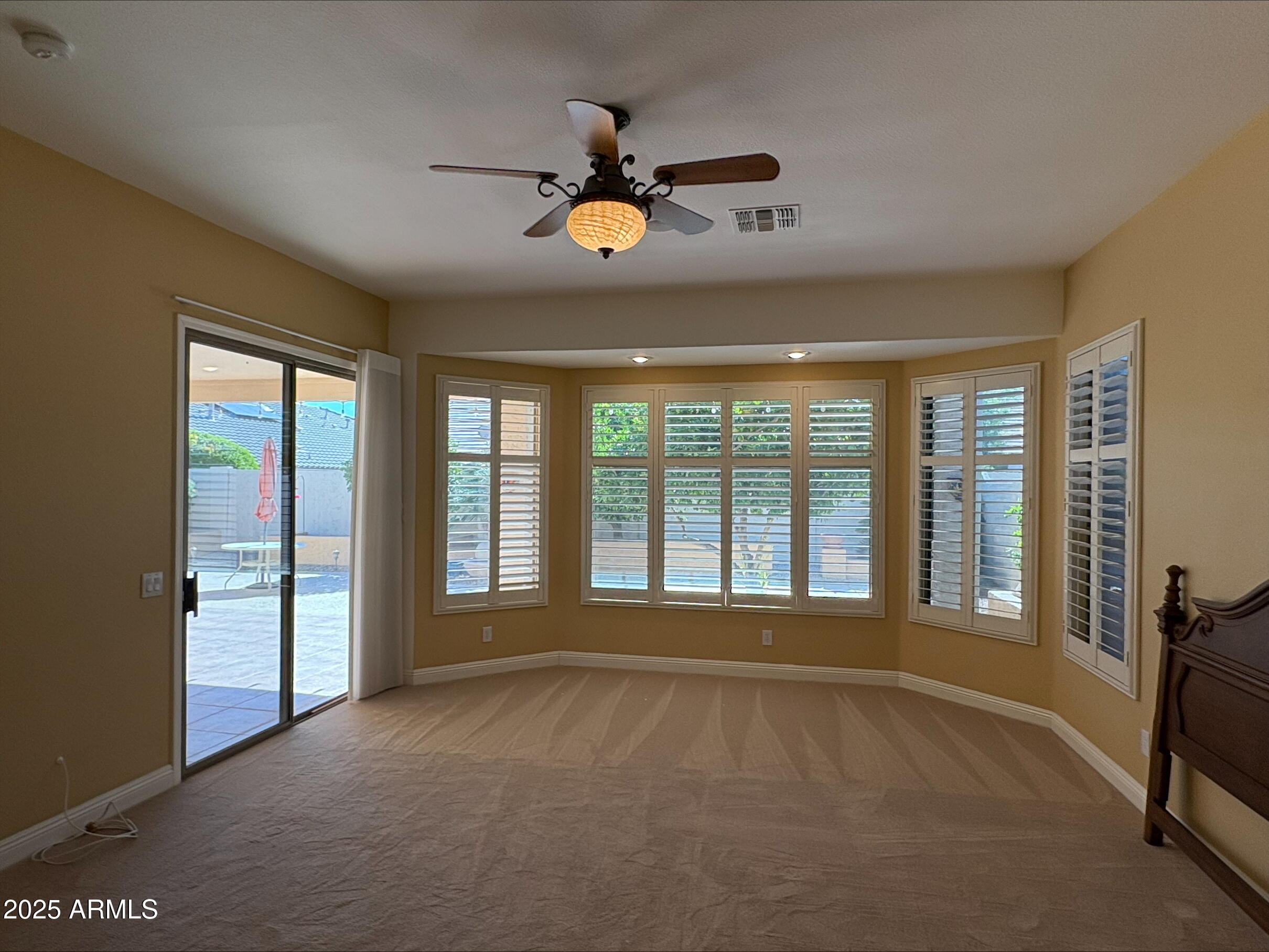 17951 West Sammy Way Surprise, AZ 85374 - Photo 16 of 24 a view of an empty room with a window