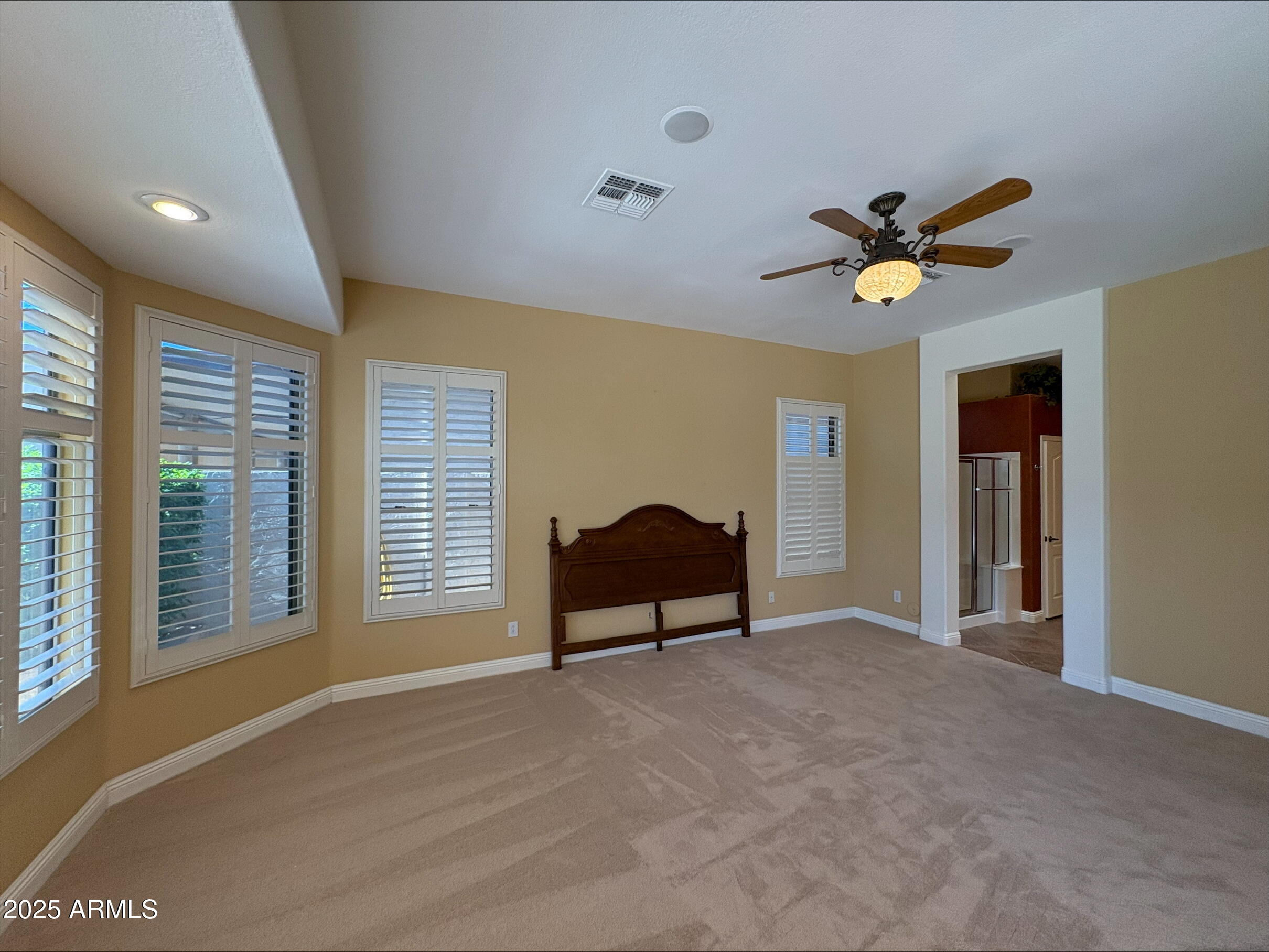 17951 West Sammy Way Surprise, AZ 85374 - Photo 17 of 24 a living room with furniture and a window