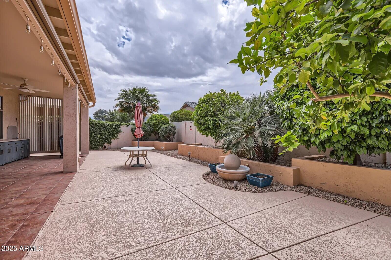 17951 West Sammy Way Surprise, AZ 85374 - Photo 22 of 24 a view of a backyard with sitting area