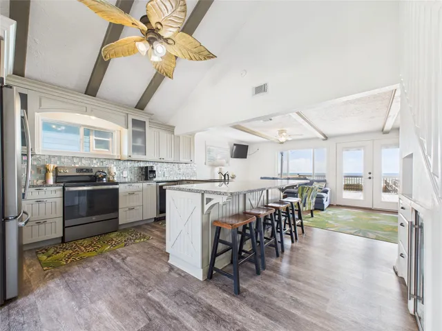 a view of a dining room with furniture