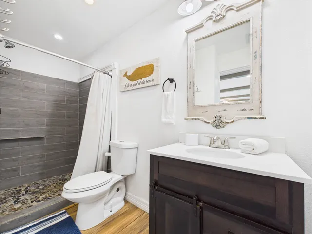 a view of a brick building with many windows