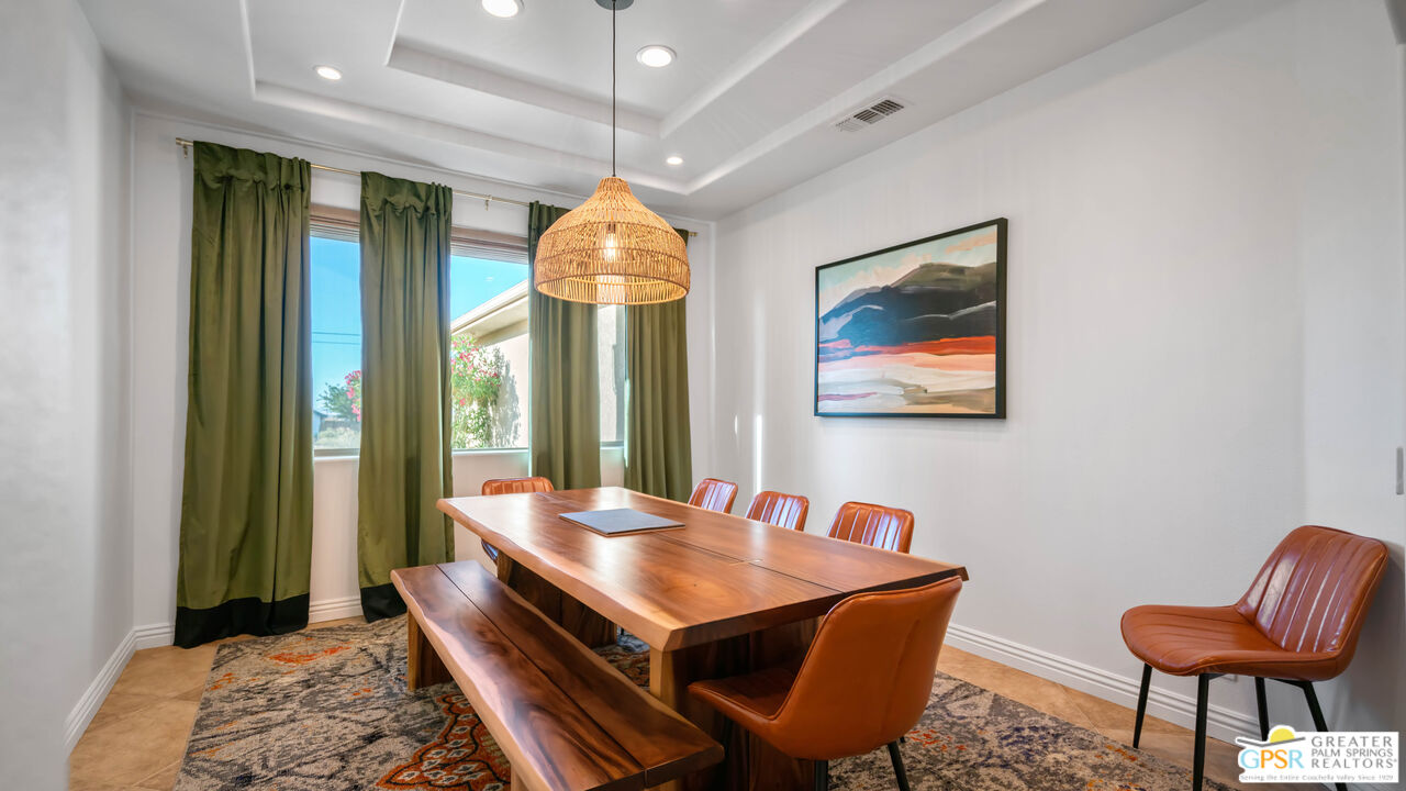 7514 Sunset Road Joshua Tree, CA 92252 - Photo 16 of 69 a room with furniture and a chandelier