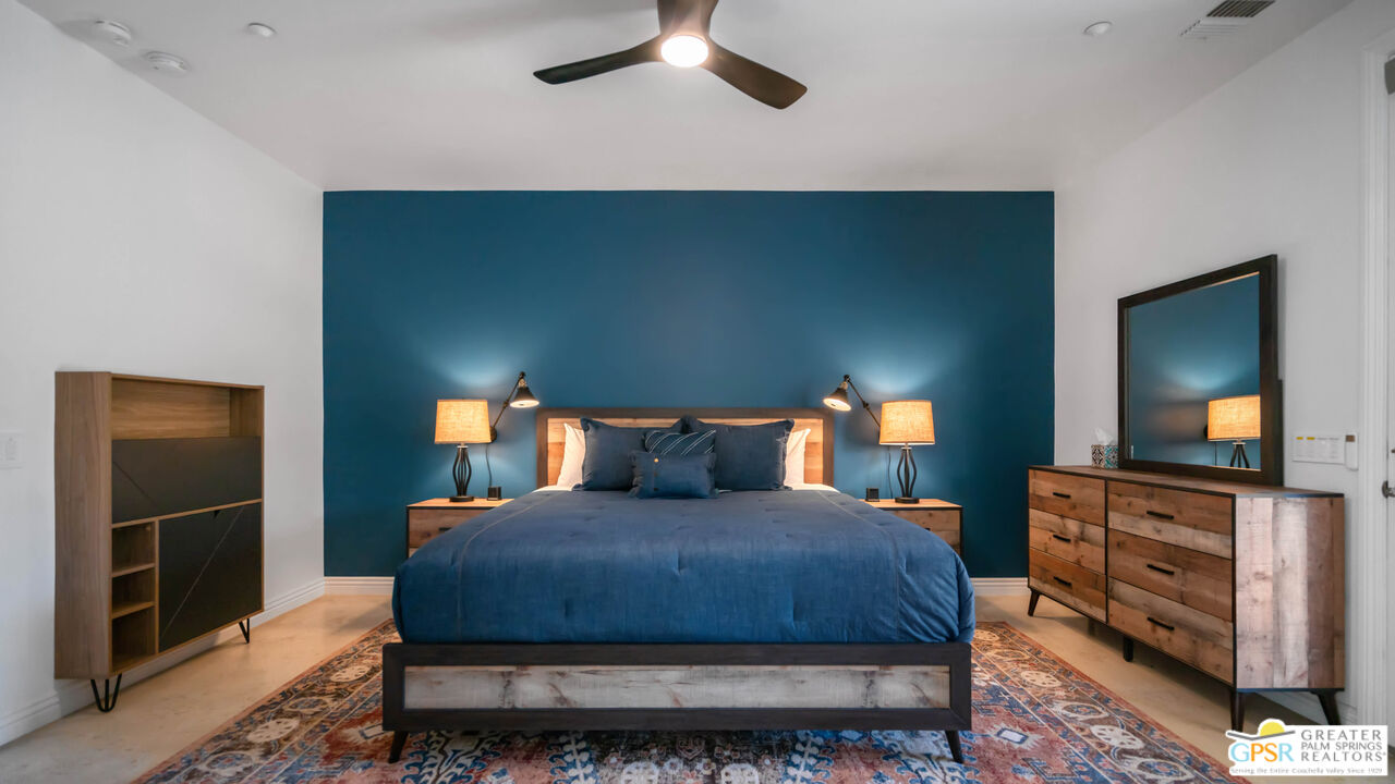 7514 Sunset Road Joshua Tree, CA 92252 - Photo 33 of 69 a bedroom with a bed and dresser