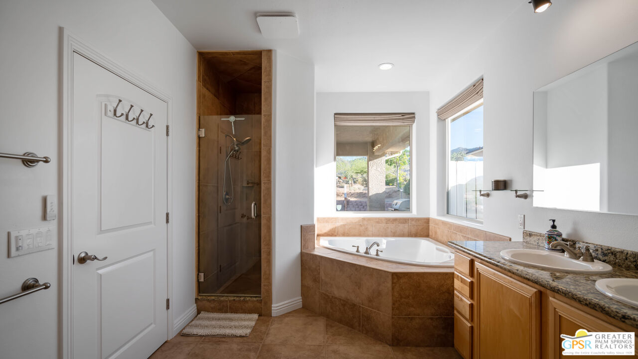 7514 Sunset Road Joshua Tree, CA 92252 - Photo 35 of 69 a bathroom with a bathtub and a sink