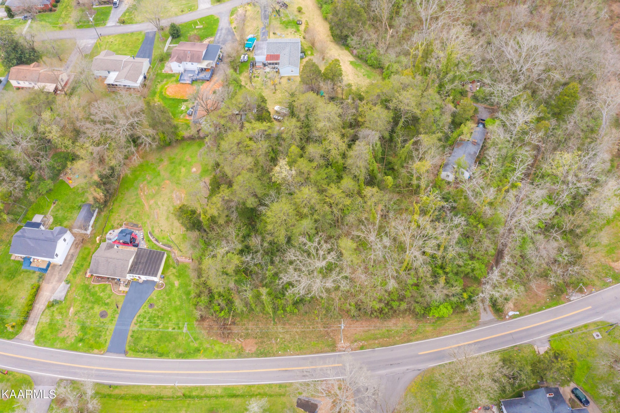 303 Stone Road Knoxville, TN 37920 - Photo 7 of 13 a view of a yard with an outdoor space