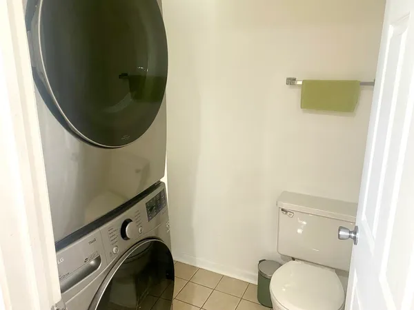 a bathroom with a toilet and a sink